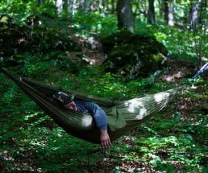 sleeping in hammock